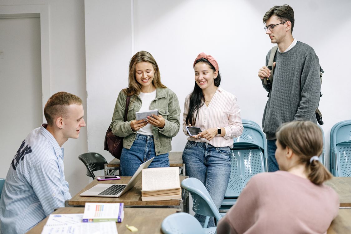 Students sharing ideas around a table
